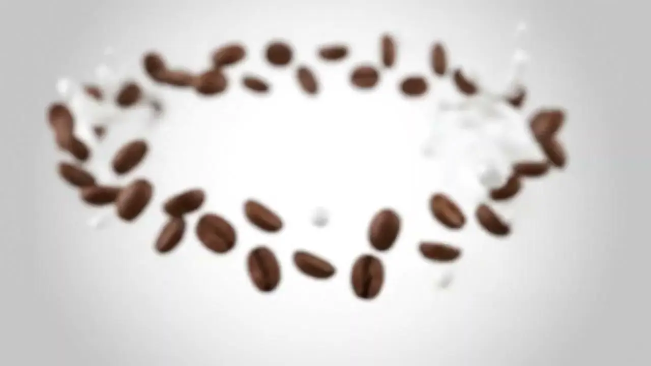 Granos de café girando en el aire
